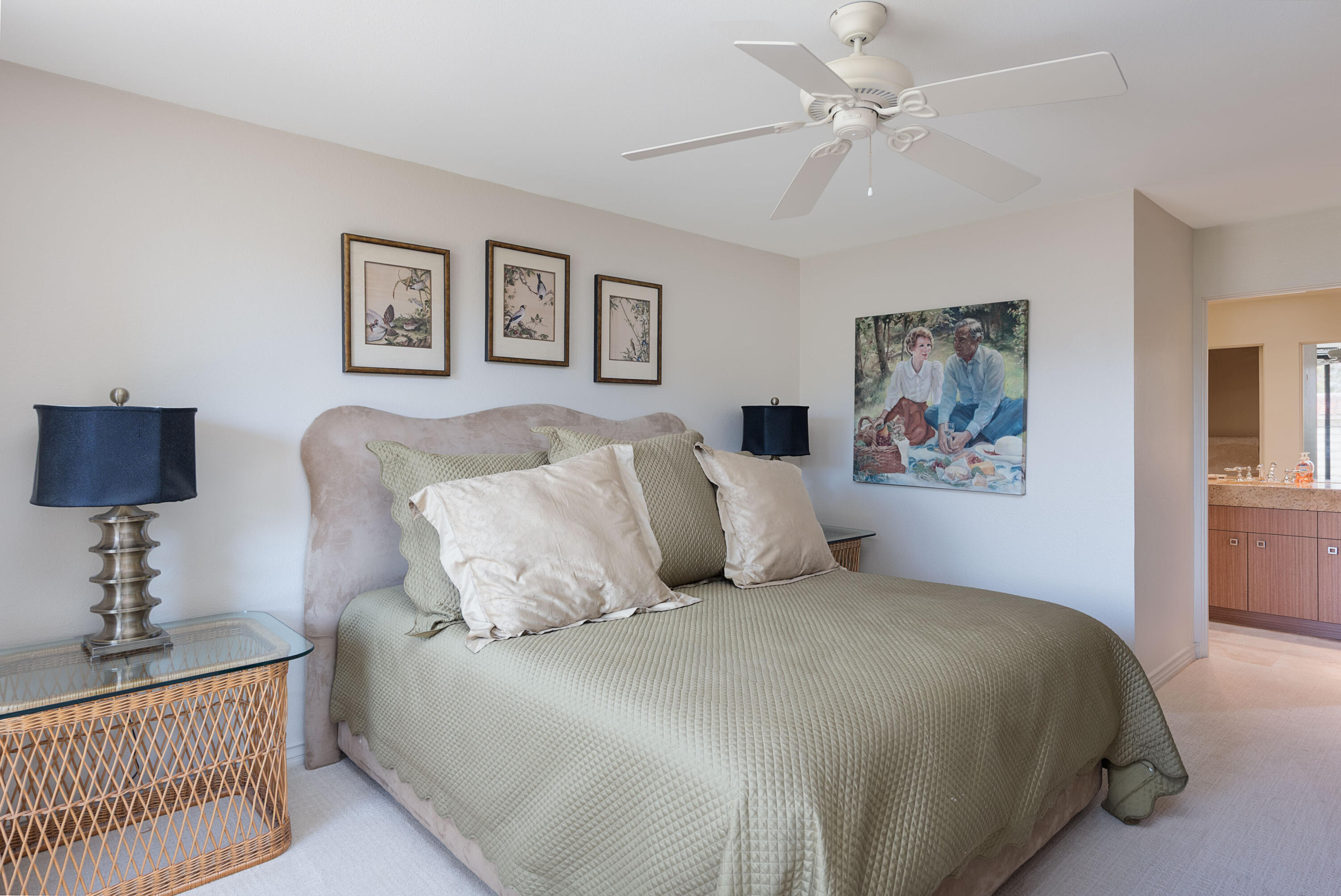 3 Cornell Drive Rancho Mirage, CA 92270 - Photo 29 of 46 a bed room with a bed and a lamp