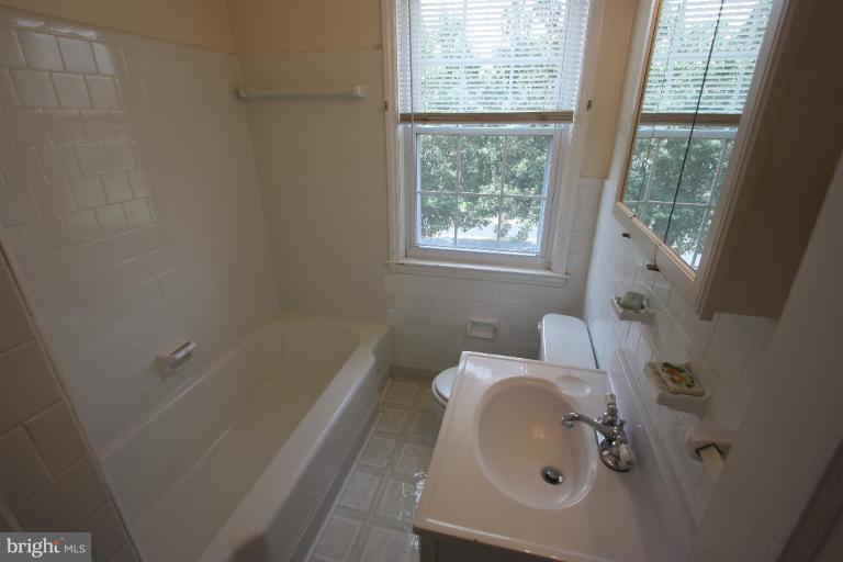1914 Edgewood Road Parkville, MD 21286 - Photo 15 of 30 2ND FLOOR BATH WITH FULL WINDOW AND RE-GLAZED TUB!