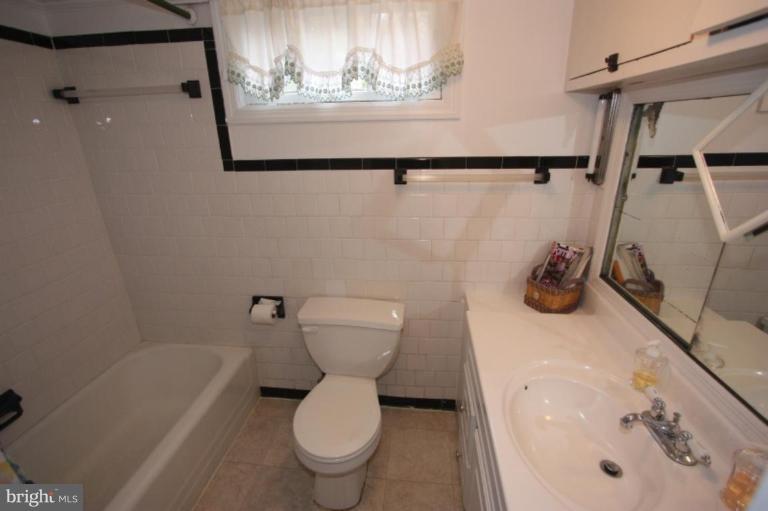 1914 Edgewood Road Parkville, MD 21286 - Photo 26 of 30 HUGE MIRROR! LARGE VANITY! STORAGE! WINDOW!