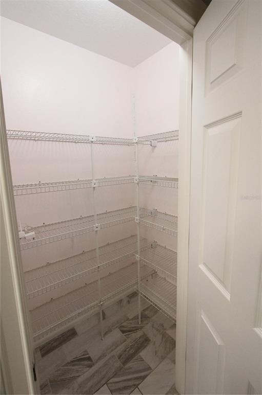 1414 Norwick Drive Lutz, FL 33559 - Photo 11 of 43 a bathroom with a shower