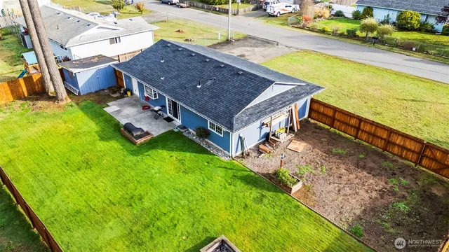 swimming pool with a yard