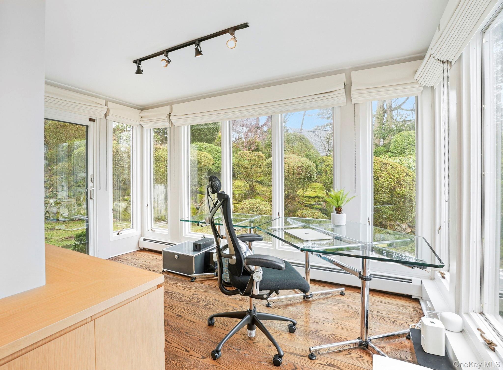 22 Taunton Road Scarsdale, NY 10583 - Photo 18 of 41 a view of a room with a large window and furniture