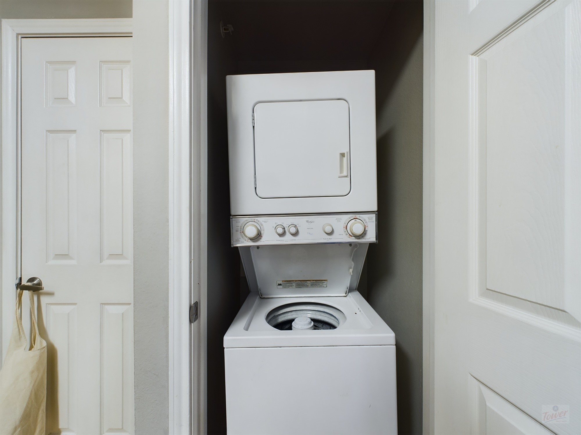 2502 Leon Street, Unit 218 Austin, TX 78705 - Photo 13 of 17 a utility room with dryer and washer