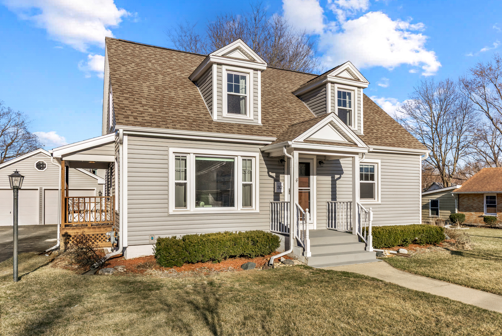 front view of a house with a yard