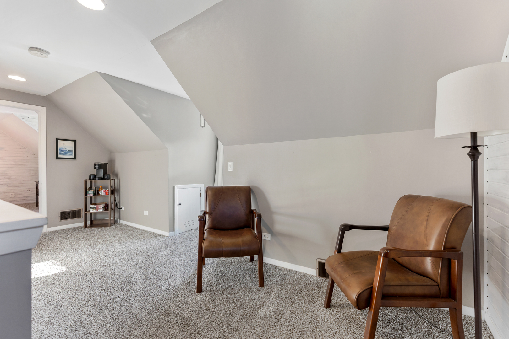 32 Jayne Street Algonquin, IL 60102 - Photo 8 of 22 a view of a livingroom with furniture and a chair