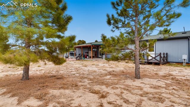 17570 Sage Crest Road Peyton, CO 80831 - Photo 22 of 25 Small deck off laundry area