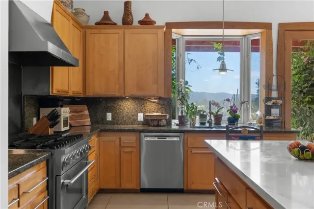 a view of balcony with wooden floor and fence