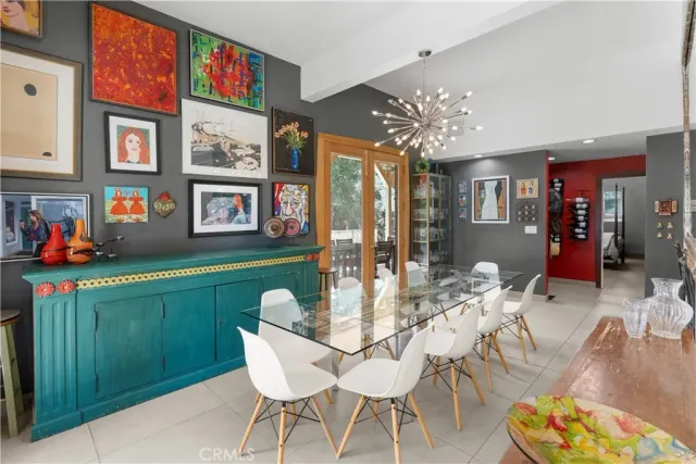 view of house with trees in the background