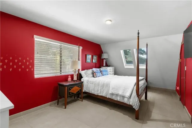 a view of a house with a mountain in the background