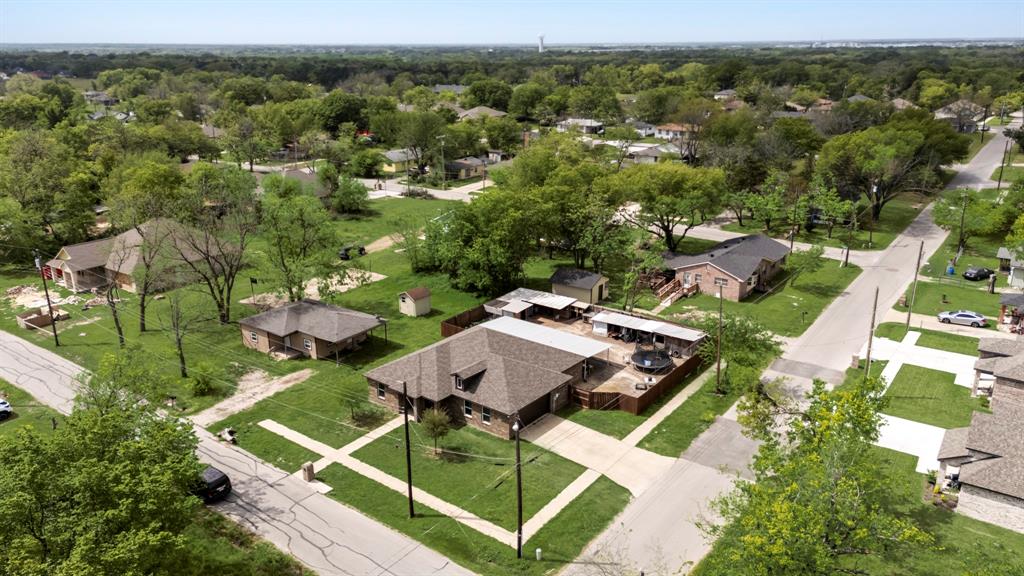 an aerial view of a house with a garden