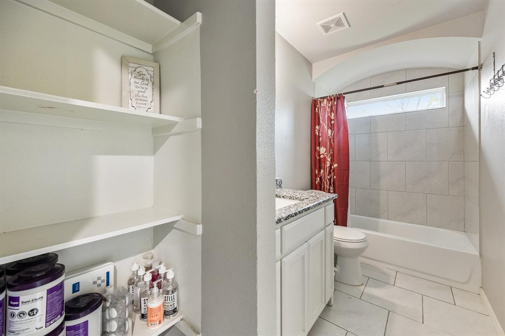 600 St Luke Street Terrell, TX 75160 - Photo 17 of 21 a bathroom with a bathtub a toilet and a shower