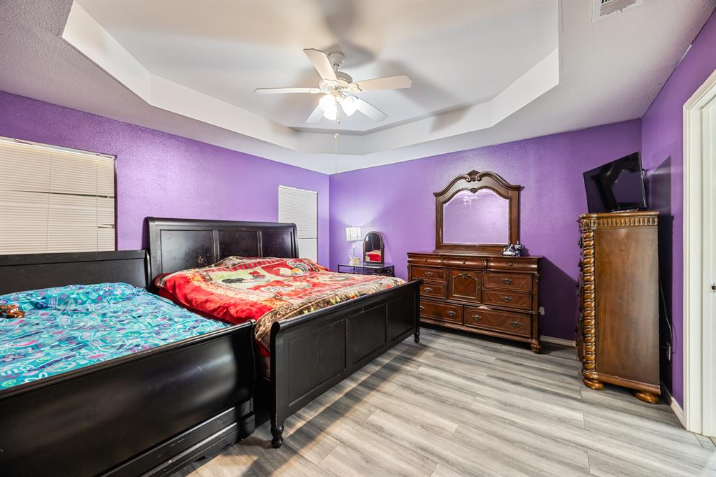 600 St Luke Street Terrell, TX 75160 - Photo 20 of 21 a bedroom with a bed and a dresser
