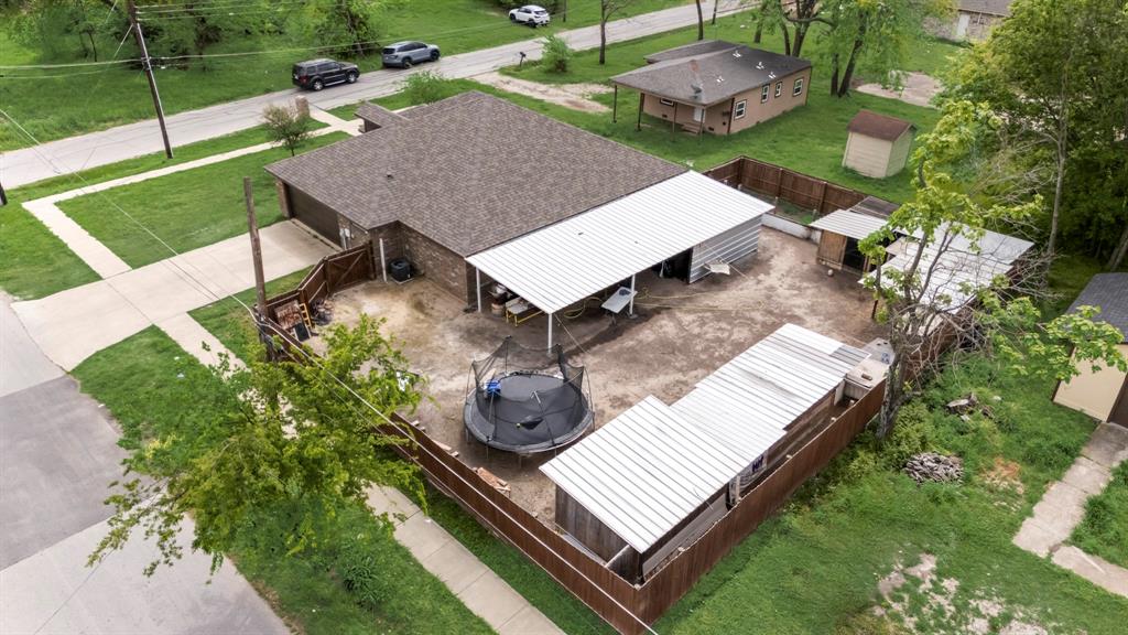 600 St Luke Street Terrell, TX 75160 - Photo 2 of 21 an aerial view of a house with garden space and street view