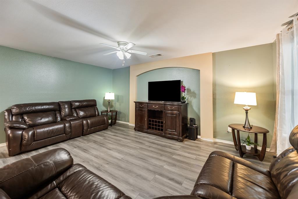 600 St Luke Street Terrell, TX 75160 - Photo 8 of 21 a living room with furniture and a flat screen tv