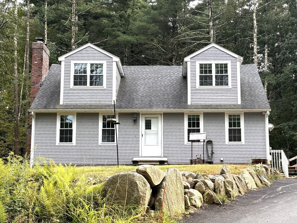 1694 Round Top Road Burrillville, RI 02830 - Photo 1 of 28 a front view of a house with a yard