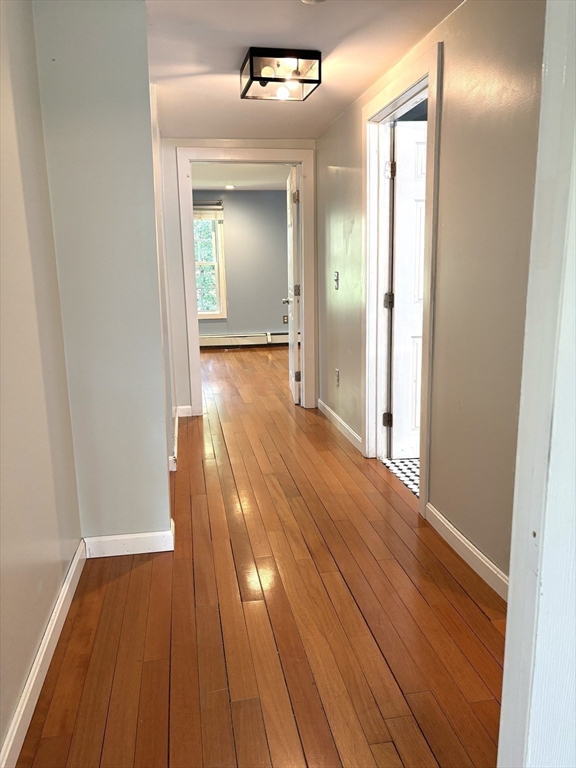 1694 Round Top Road Burrillville, RI 02830 - Photo 19 of 28 a view of a room with wooden floor