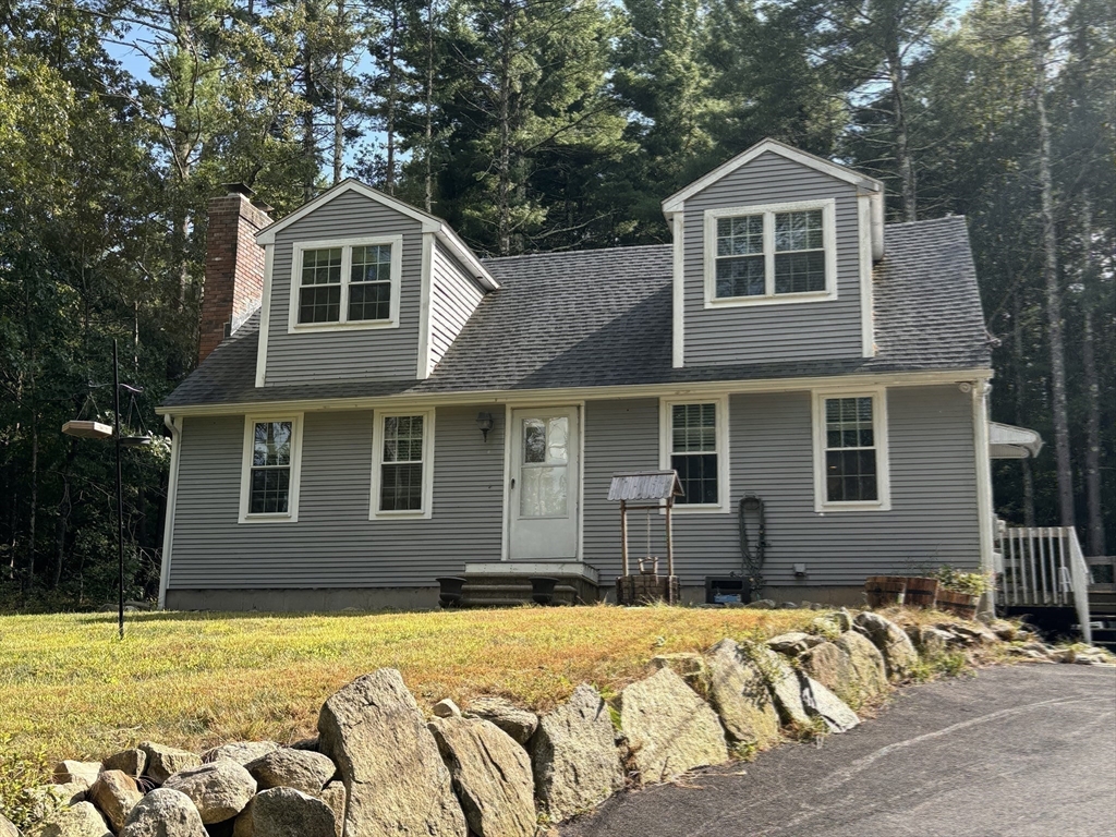 1694 Round Top Road Burrillville, RI 02830 - Photo 21 of 28 a front view of a house with a yard