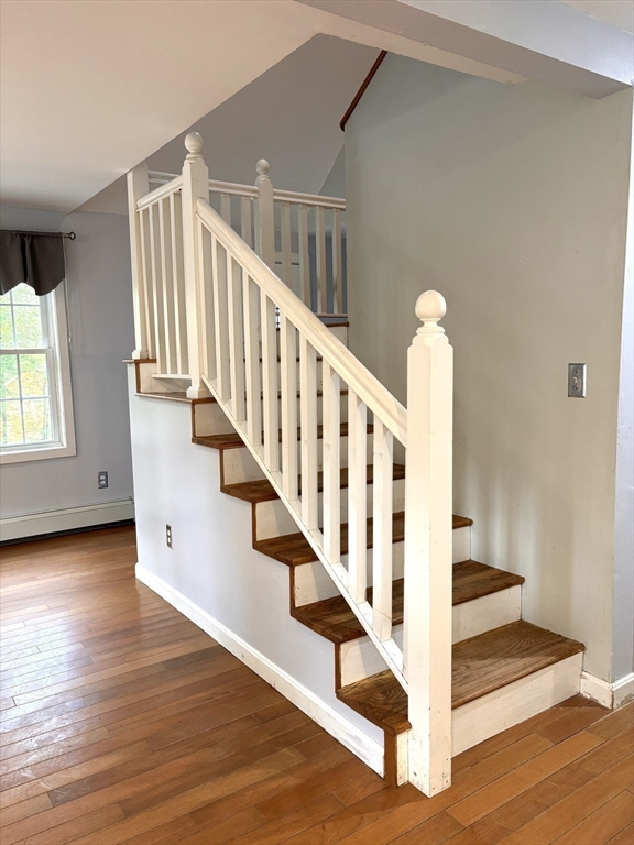 1694 Round Top Road Burrillville, RI 02830 - Photo 6 of 28 a view of entryway and hall with wooden floor