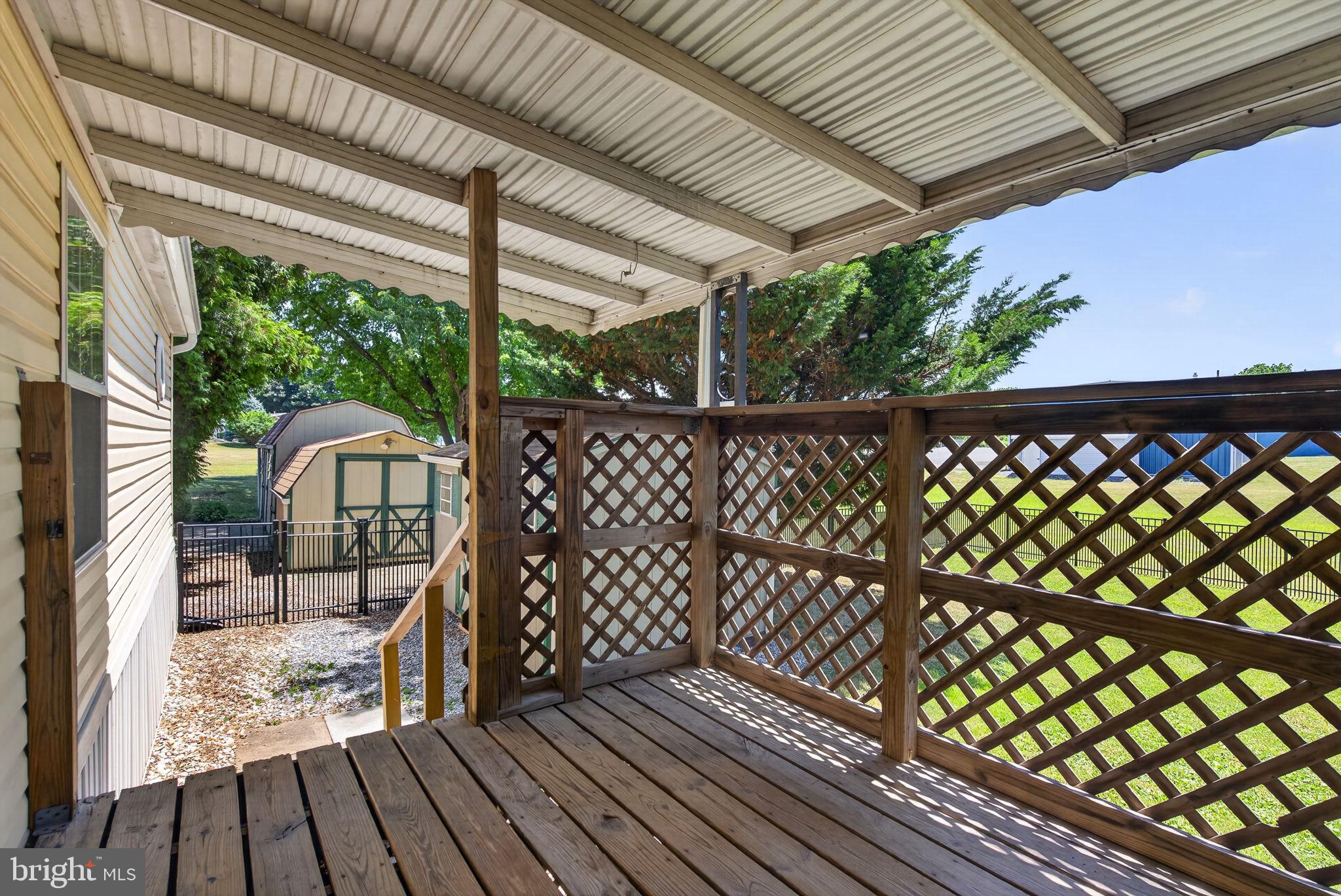 1910 Schubert Road, Unit 8 Bethel, PA 19507 - Photo 30 of 40 Covered deck for outdoor living space