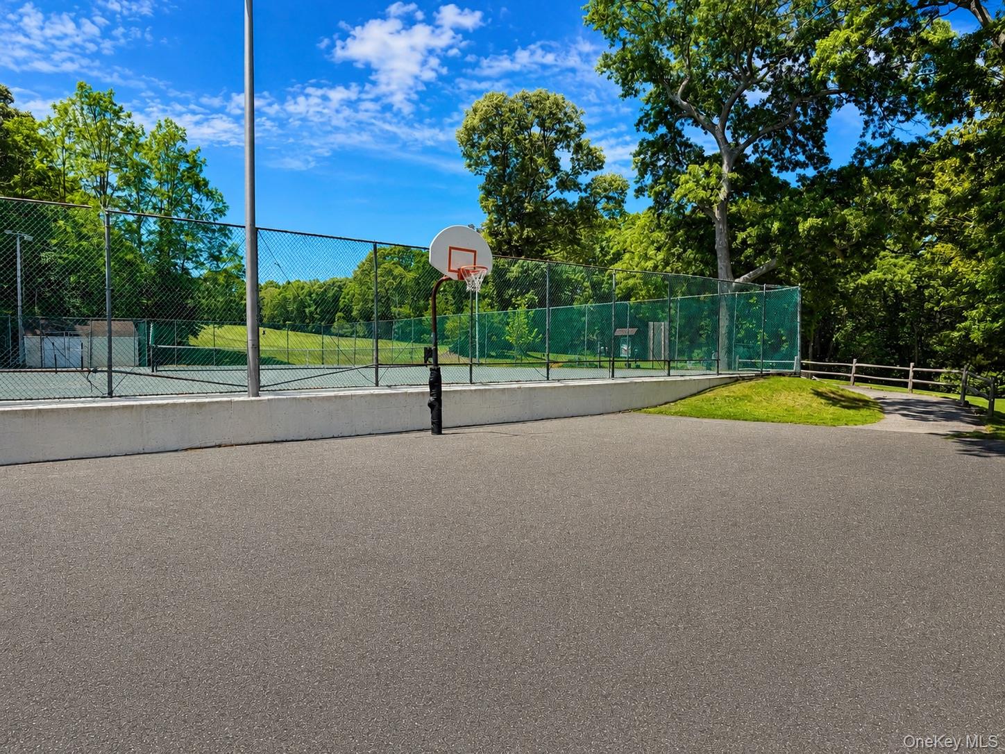 201 Birchwood Road, Unit 201 Coram, NY 11727 - Photo 26 of 27 a view of a park with slide