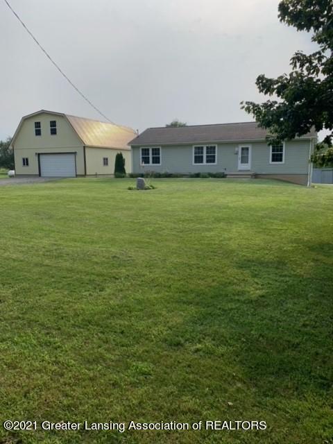 4050 Matthews Road Charlotte, MI 48813 - Photo 2 of 35 Side View - Front of House