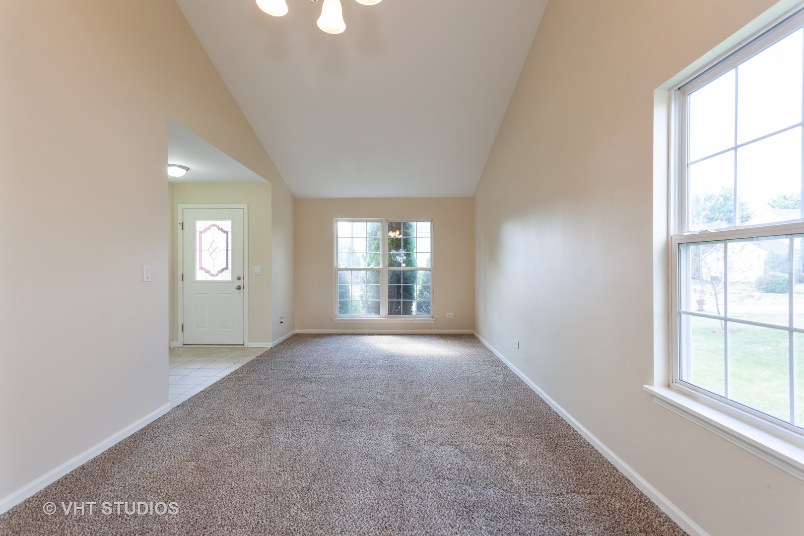 2068 Sutcliffe Drive Romeoville, IL 60446 - Photo 4 of 10 an empty room with windows and closet