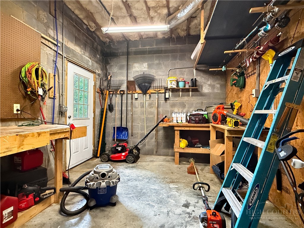 1173 Hopewell Church Road Boone, NC 28607 - Photo 29 of 39 a storage room with furniture and gym equipment