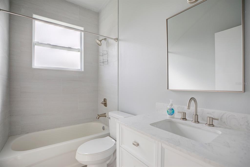2545 Odessa Road Avon Park, FL 33825 - Photo 27 of 33 a bathroom with a sink toilet and shower