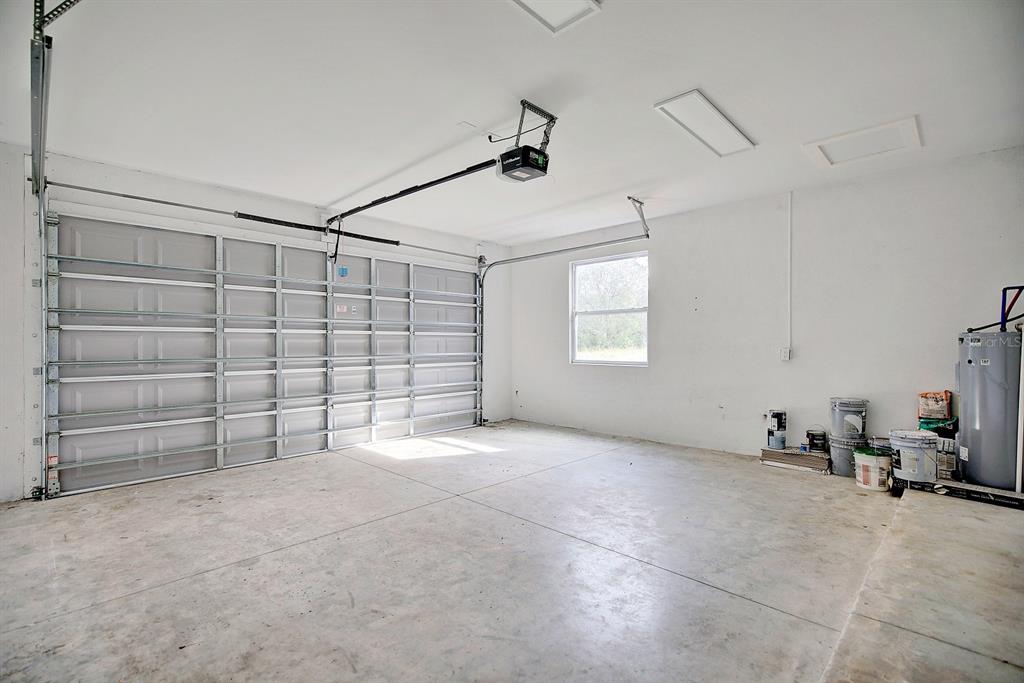 2545 Odessa Road Avon Park, FL 33825 - Photo 31 of 33 a view of empty room with garage and window