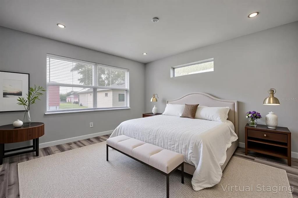 2545 Odessa Road Avon Park, FL 33825 - Photo 7 of 33 a bedroom with a bed window and a table