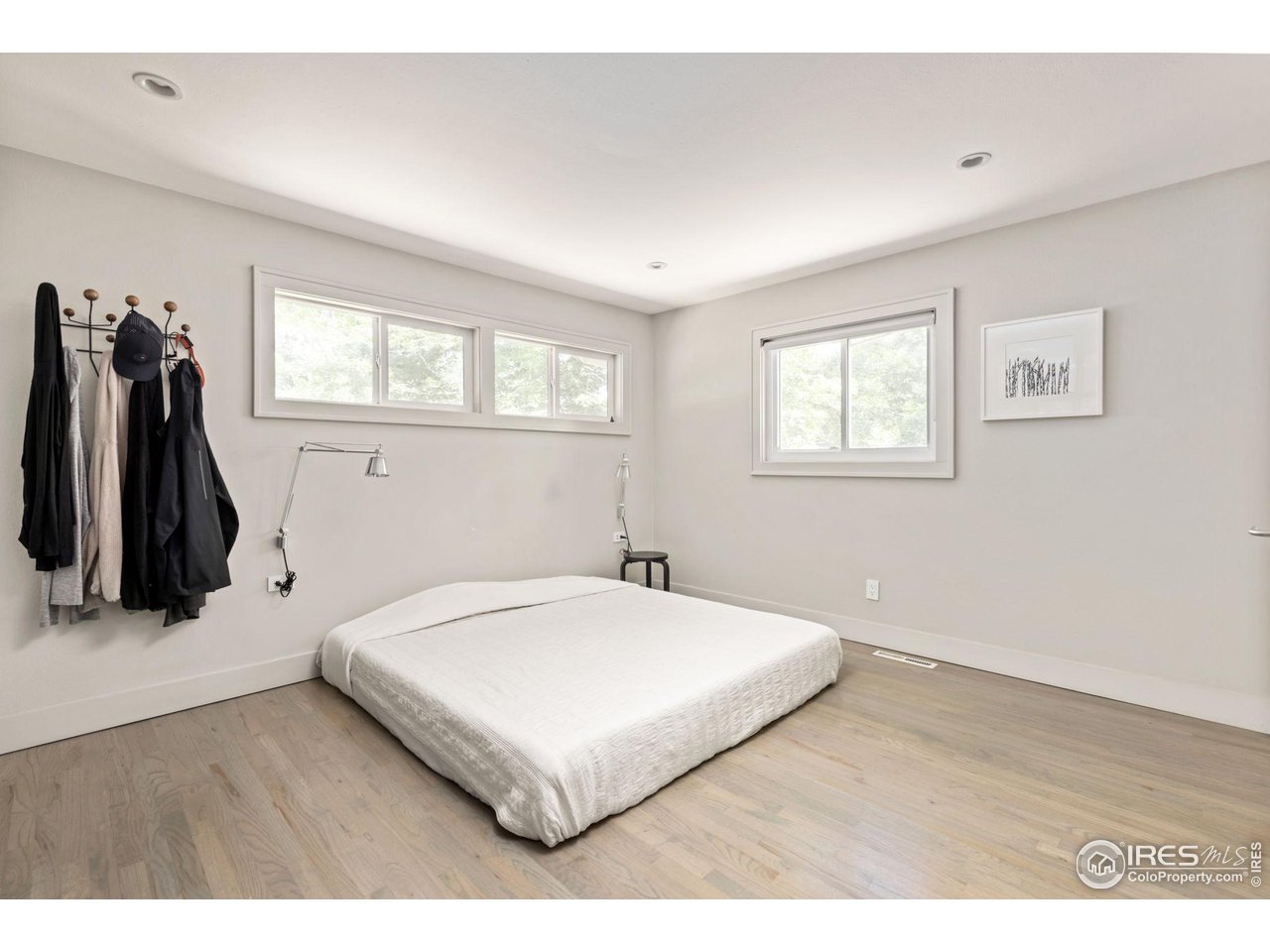 7705 Baseline Road Boulder, CO 80303 - Photo 14 of 40 a bedroom with a bed and a window