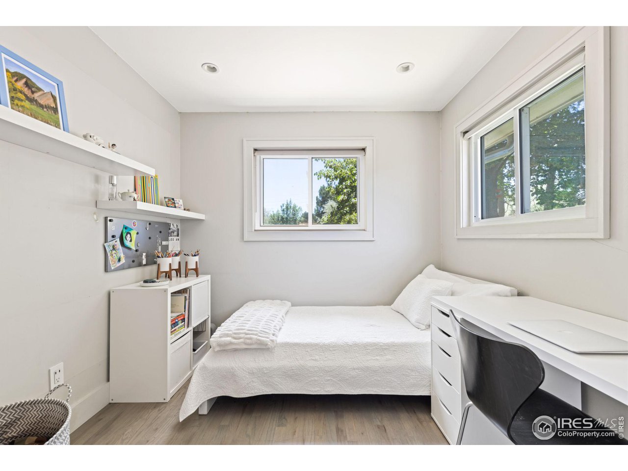 7705 Baseline Road Boulder, CO 80303 - Photo 20 of 40 a bedroom with a bed and a window