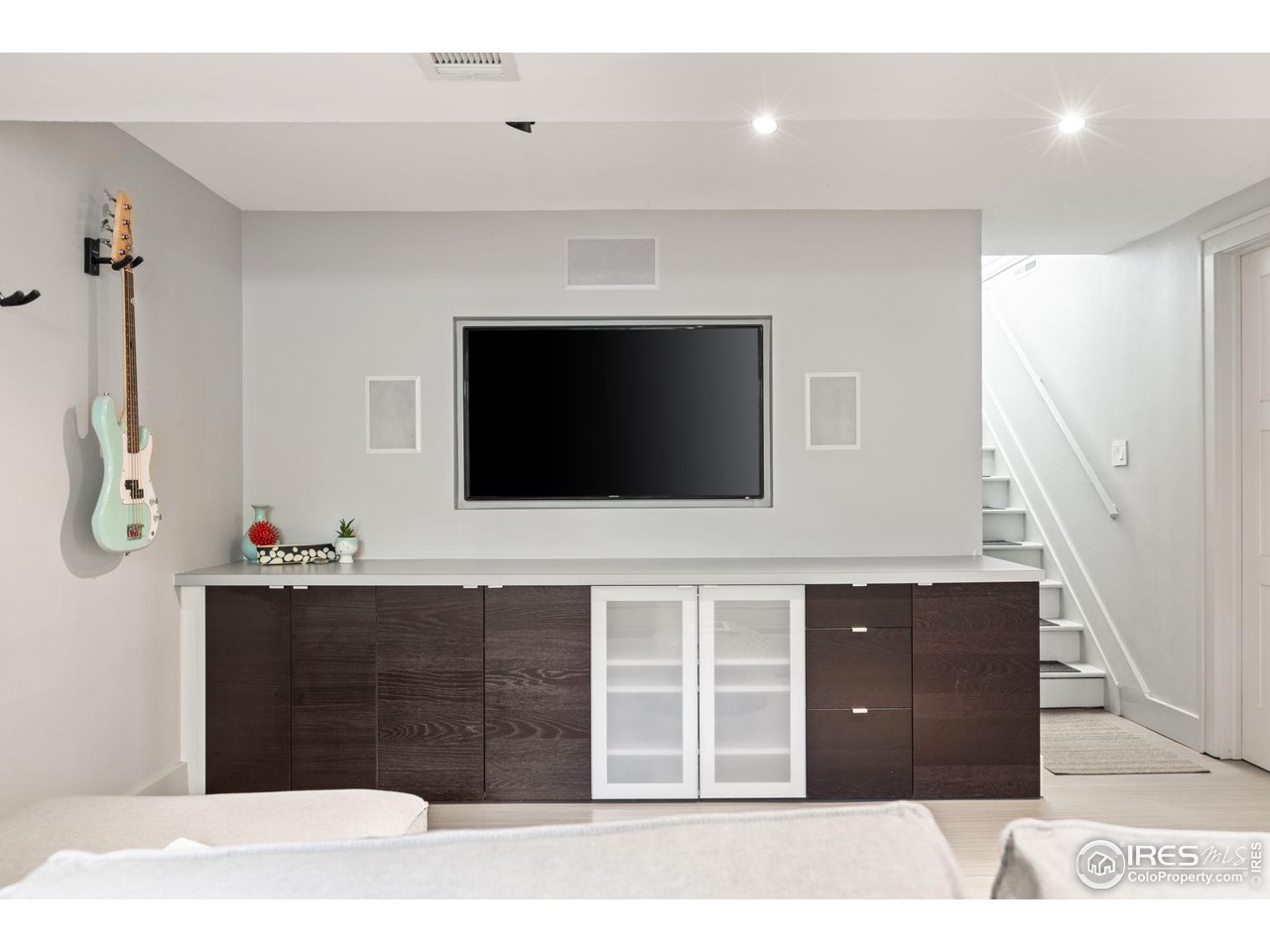 7705 Baseline Road Boulder, CO 80303 - Photo 28 of 40 a living room with a flat screen tv and kitchen view