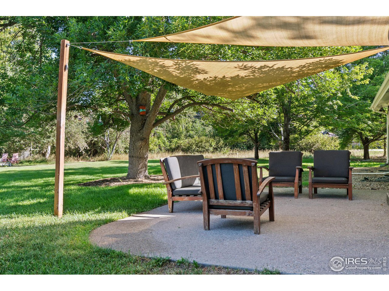 7705 Baseline Road Boulder, CO 80303 - Photo 30 of 40 a view of a bench in the garden near a lake