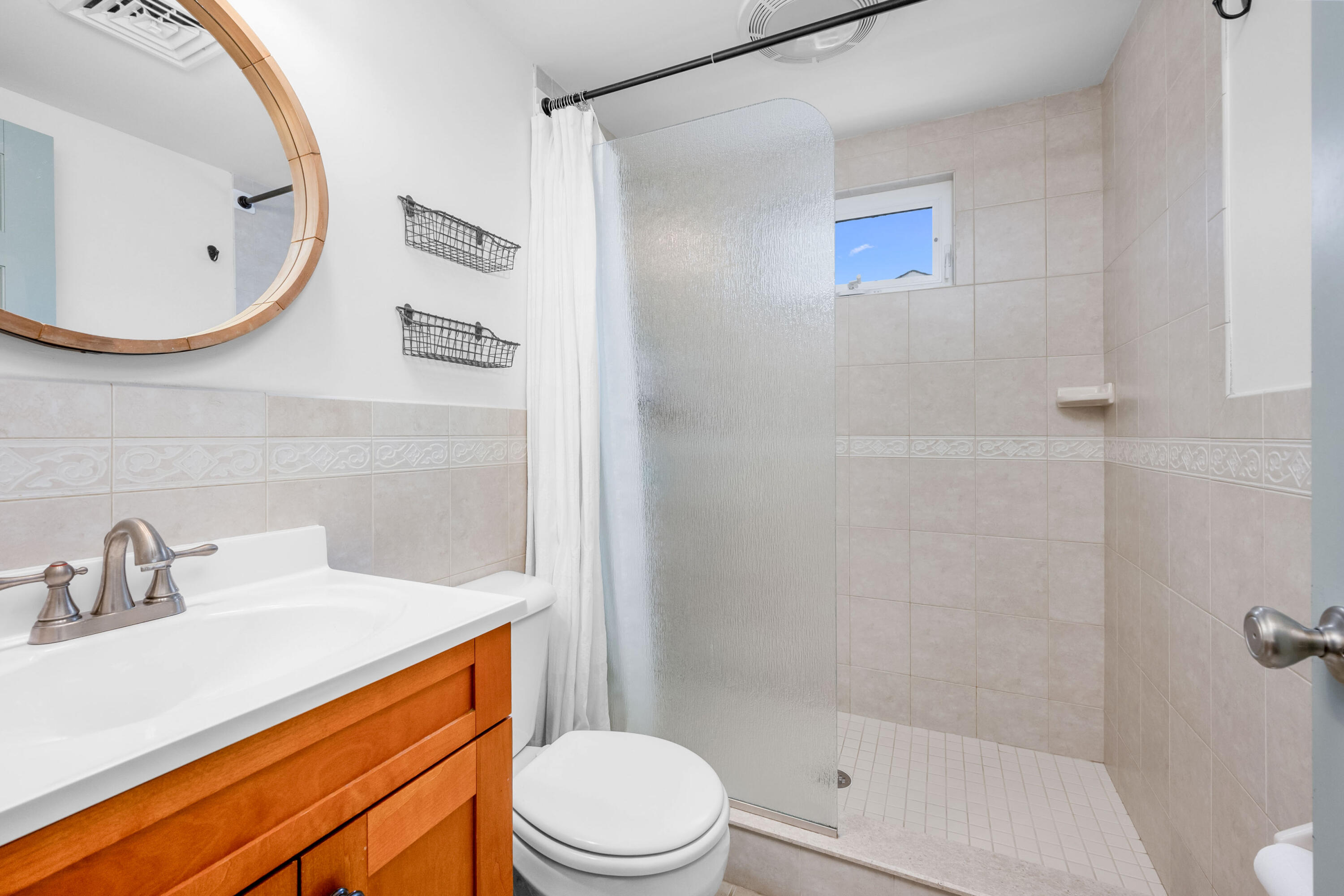 22 Wixon Road Dennis Port, MA 02639 - Photo 17 of 28 a bathroom with a sink a toilet and shower