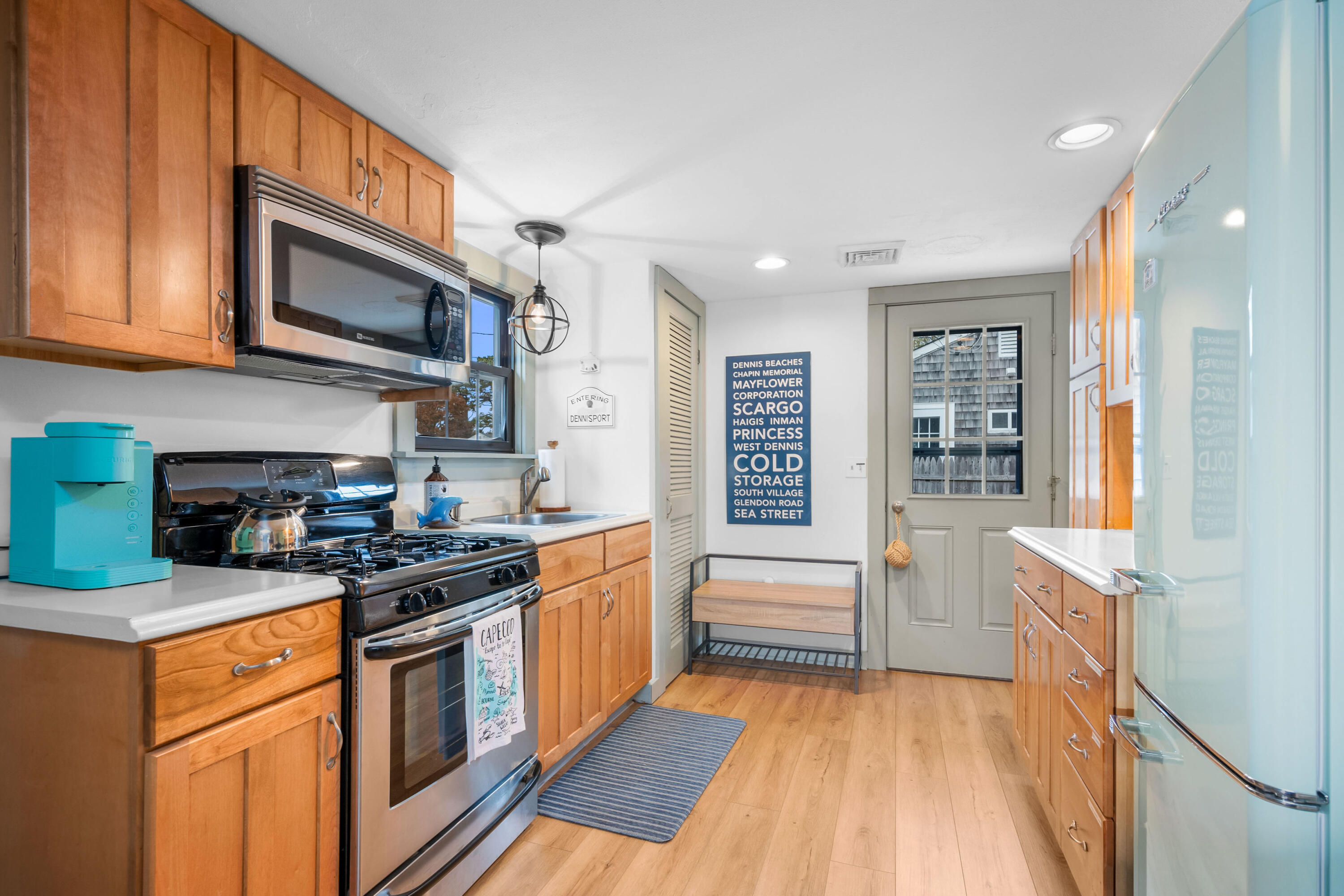 22 Wixon Road Dennis Port, MA 02639 - Photo 6 of 28 a kitchen with stainless steel appliances granite countertop a stove and a sink