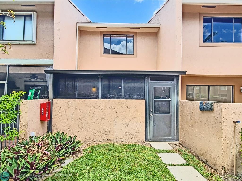 139 Sparrow Drive, Unit 4B Royal Palm Beach, FL 33411 - Photo 26 of 48 a view of outdoor space