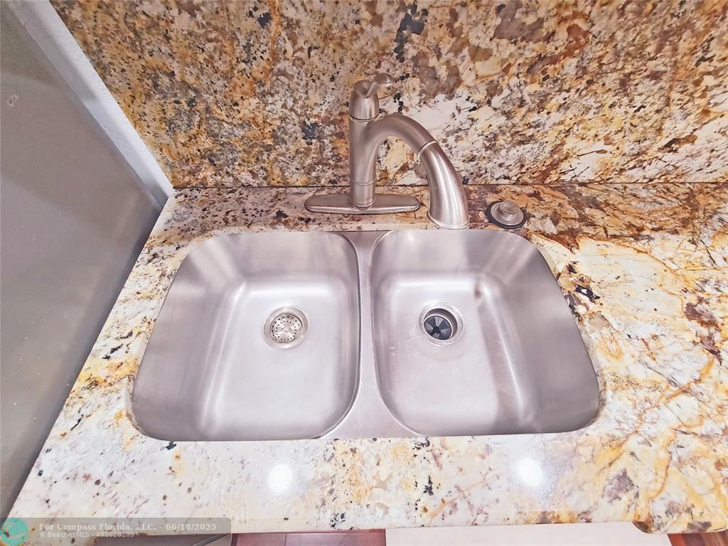 139 Sparrow Drive, Unit 4B Royal Palm Beach, FL 33411 - Photo 28 of 48 a close view of tap