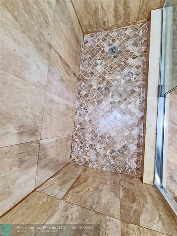 139 Sparrow Drive, Unit 4B Royal Palm Beach, FL 33411 - Photo 34 of 48 a bathroom with a shower