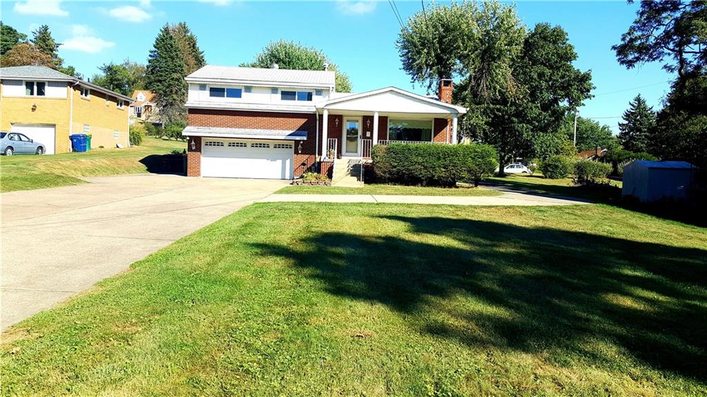 1076 Silver Lane McKees Rocks, PA 15136 - Photo 19 of 21 Home sets far back from road. Large generous flat front yard with ample parking.