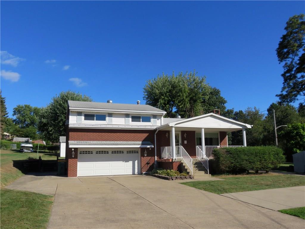 1076 Silver Lane McKees Rocks, PA 15136 - Photo 20 of 21 Home has ample parking. Long driveway which also wraps along the side of home to detached garage.