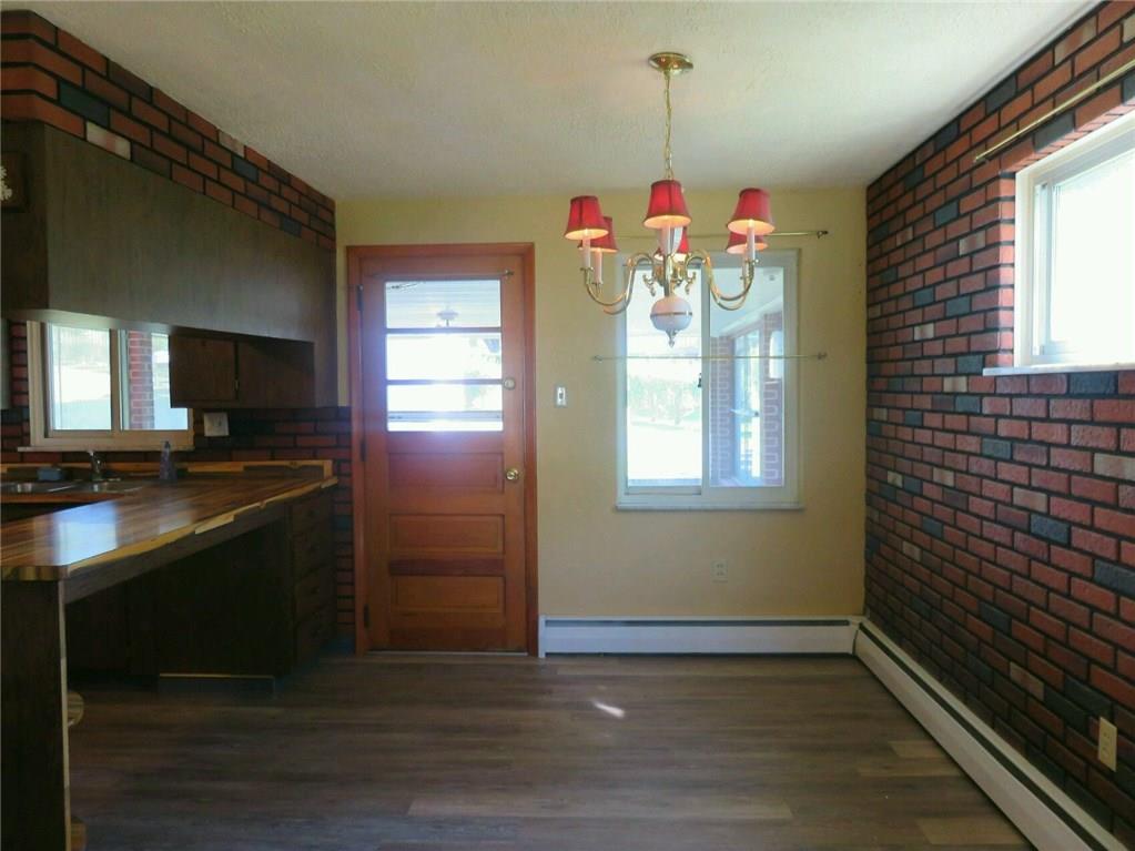 1076 Silver Lane McKees Rocks, PA 15136 - Photo 5 of 21 Kitchen& flows into dining (combo 16X12). The large (19X18) covered porch is off the kitchen/dining areafor social gatherings.