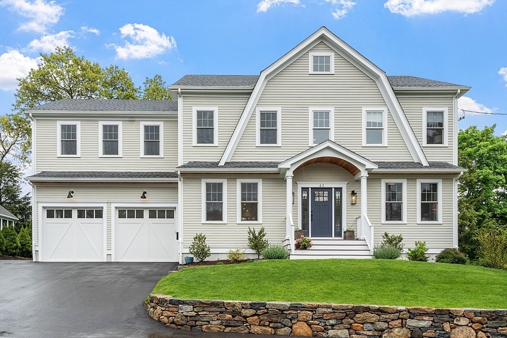63 Thornton Road Needham, MA 02492 - Photo 1 of 41 a front view of a house with a yard