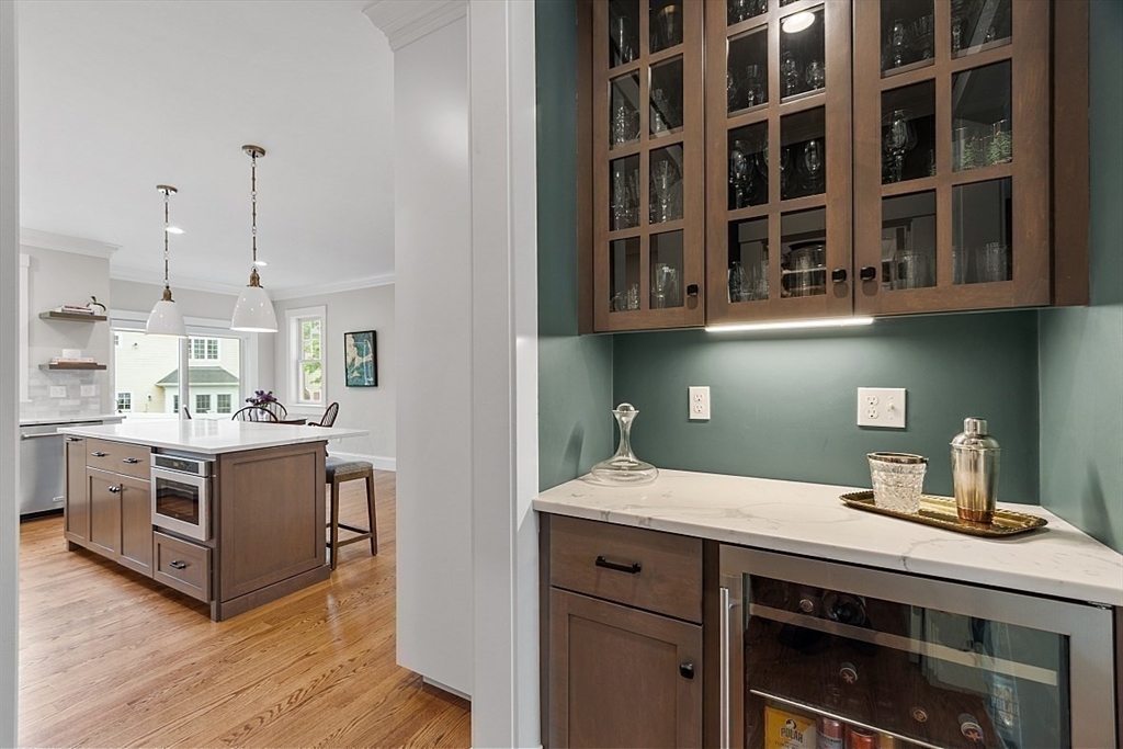 63 Thornton Road Needham, MA 02492 - Photo 13 of 41 a kitchen with a stove and cabinets