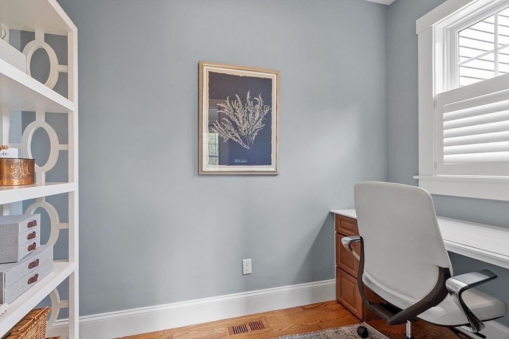 63 Thornton Road Needham, MA 02492 - Photo 16 of 41 a view of a workspace with furniture and a window