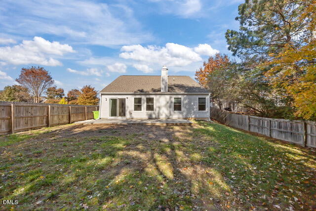 7604 Brighton Village Drive Raleigh, NC 27616 - Photo 22 of 30 a view of a yard in front of a house with a large tree