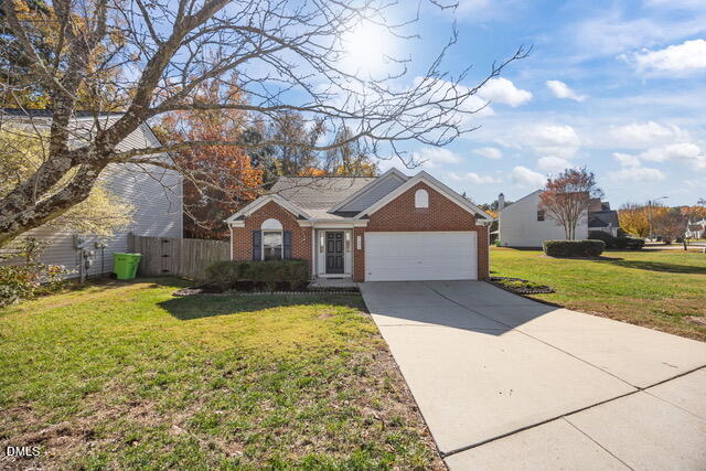 7604 Brighton Village Drive Raleigh, NC 27616 - Photo 2 of 30 a front view of house with yard and green space