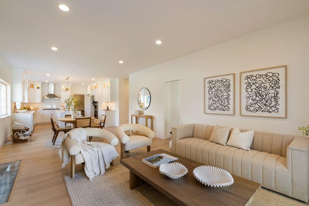 10496 South Stelling Road Cupertino, CA 95014 - Photo 11 of 54 a living room with furniture and a table