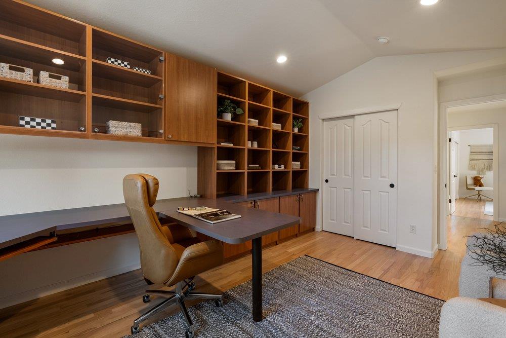 10496 South Stelling Road Cupertino, CA 95014 - Photo 34 of 54 a workspace with furniture and wooden floor