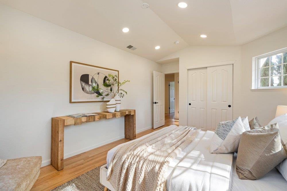 10496 South Stelling Road Cupertino, CA 95014 - Photo 36 of 54 a bedroom with a bed and a dresser